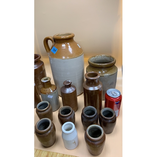 144 - Job lot of stoneware, flagons and jars