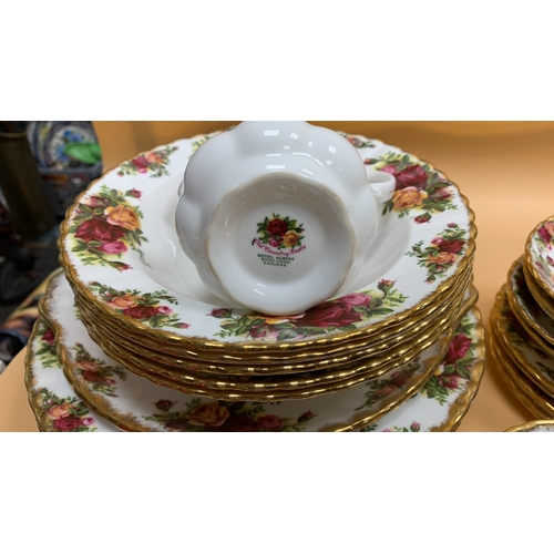 148 - Collection of Royal Albert 'Old Country Rose' bone china dinner service 4 people plus extras