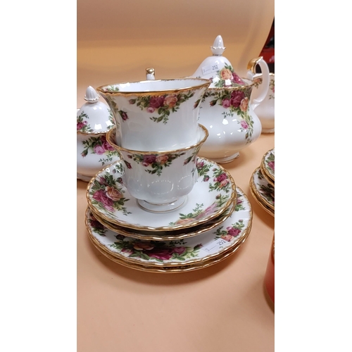 150 - Royal Albert 'Old Country Rose' bone china tea set including tea pot, sugar dish and milk jug