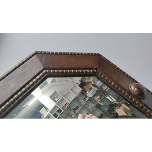 196 - Edwardian oak framed bevel edged mirror 49cm x 80cm