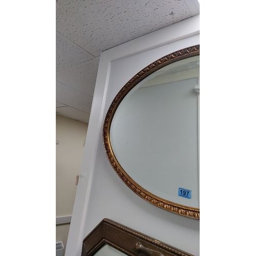 197 - Oval gilt resin framed bevel edged mirror 50cm x 72cm