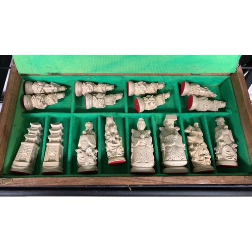 238 - Mid century complete chess set box with oriental chess pieces