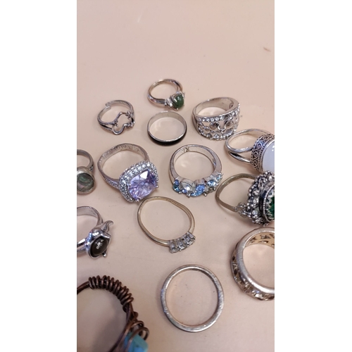 260 - Job lot of costume white metal and yellow metal rings