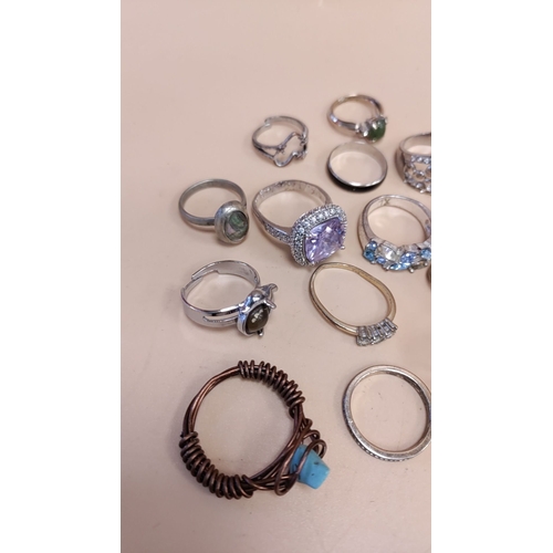 260 - Job lot of costume white metal and yellow metal rings