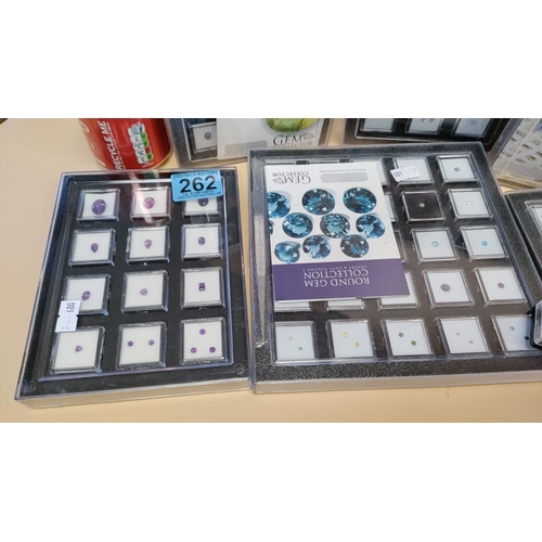 262 - Gem Collectors boxed Gems inc Amethysts, Tanzanites, Cabochons and other precious gems