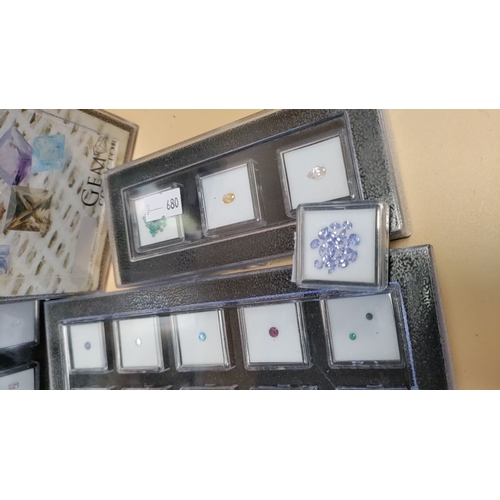 262 - Gem Collectors boxed Gems inc Amethysts, Tanzanites, Cabochons and other precious gems