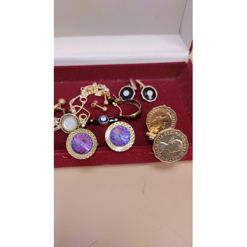 267 - Red velvet box of cufflinks and other yellow metal jewellery