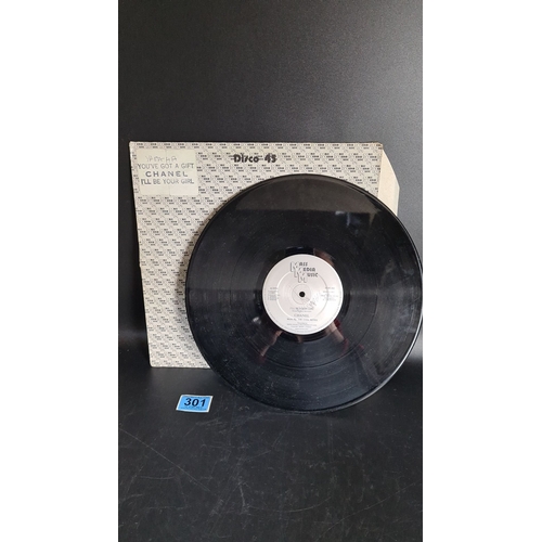 301 - Vinyl record by Chanel featuring "You've Got a Gift" and "I'll Be Your Girl," pr... 