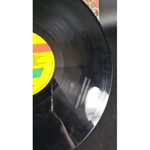 309 - Reggae Regular featuring Eastwood, "House Party" 12" vinyl single. Greensleeves Recor... 