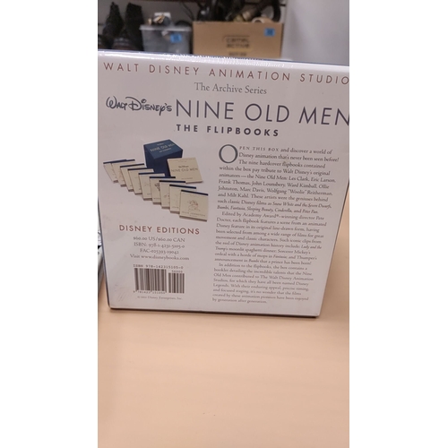 31 - Disney new and sealed box set of Nine Old Men The flipbooks and a Mickey mouse museum story book