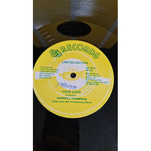 312 - Vinyl record "Your love" by Carroll Thompson with yellow cover and label from GG Records. ... 