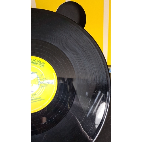 312 - Vinyl record "Your love" by Carroll Thompson with yellow cover and label from GG Records. ... 