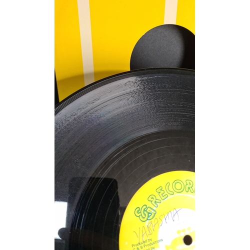 312 - Vinyl record "Your love" by Carroll Thompson with yellow cover and label from GG Records. ... 