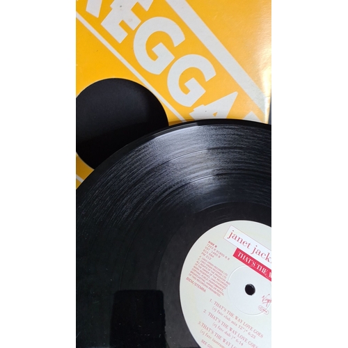 314 - Vinyl record featuring Janet Jackson's "That's the Way Love Goes," with a distinctive yell... 