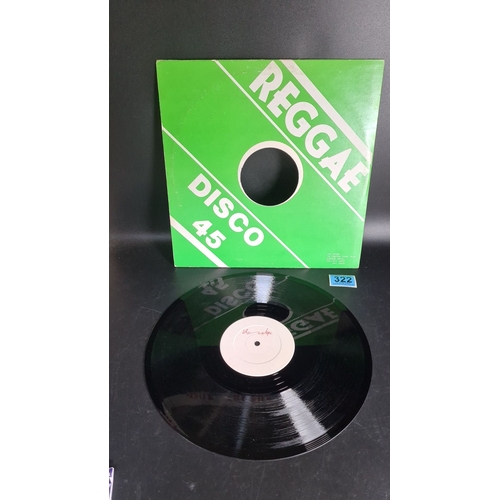 322 - Vinyl record features a white label with indescribable unknown artist  red text, song is Love Trap T... 