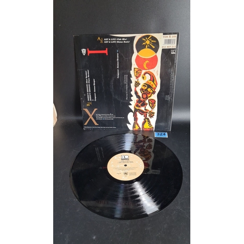 324 - 12- inch Vinyl record of Get a life by Soul II Soul, 1989, All records in this sale sold individuall... 