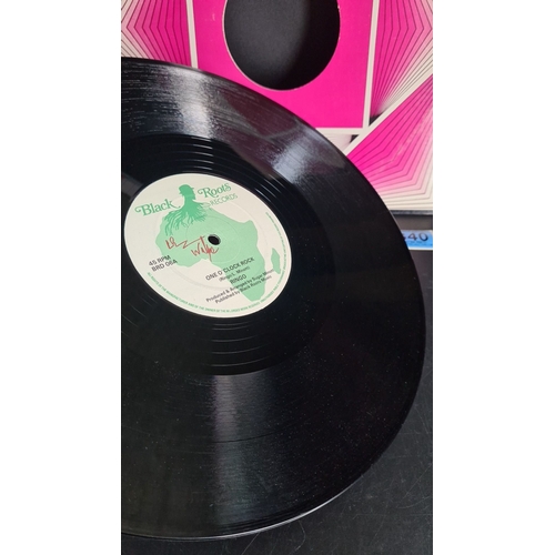 340 - Vinyl record featuring "History" by Radical Youth, produced by Sugar Minott, under Black R... 