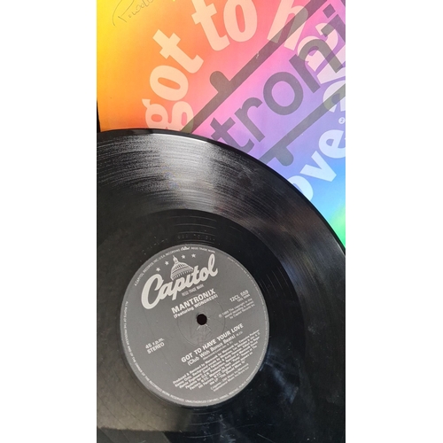 348 - Capitol Records 12" vinyl single by Mantronix featuring Wondress. Tracks: "Got To Have You... 