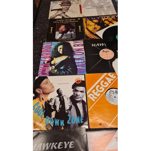 374 - Joblot of vintage 12-inch vinyl records featuring various genres, including reggae and soul. Notable... 