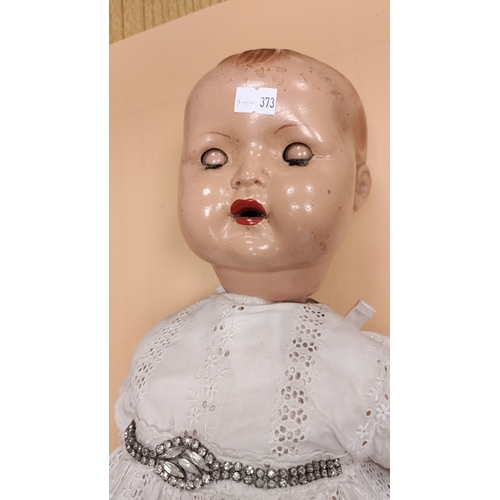 39 - Antique hand painted baby doll with moving limbs