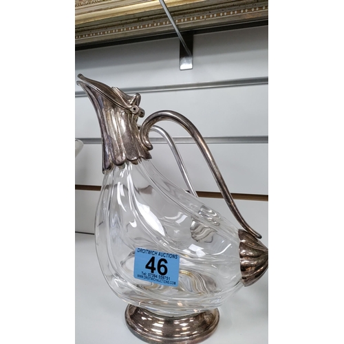 46 - Two Duck decanters with silver plated finish