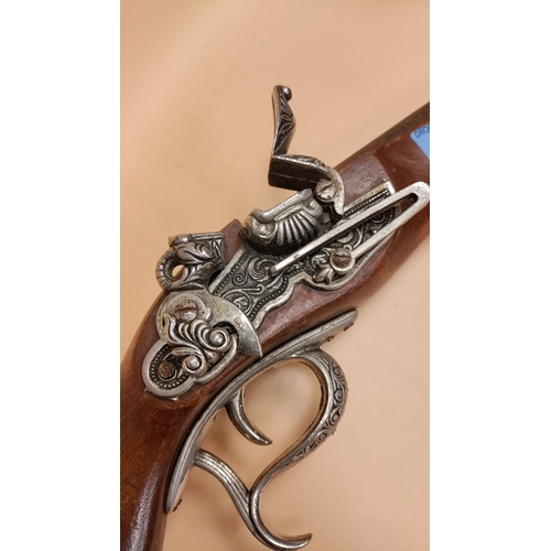 70 - A repro flintlock pistol