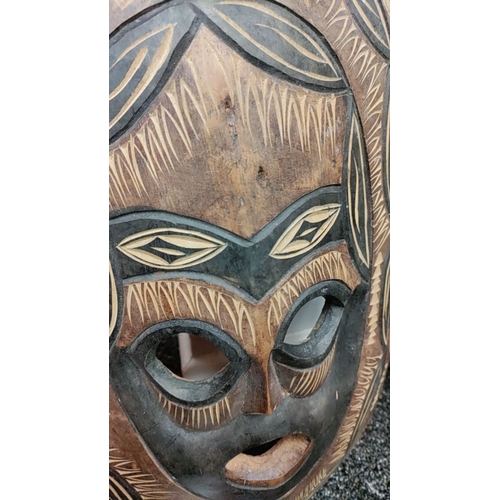 75 - Large hand carved African tribal wall mask