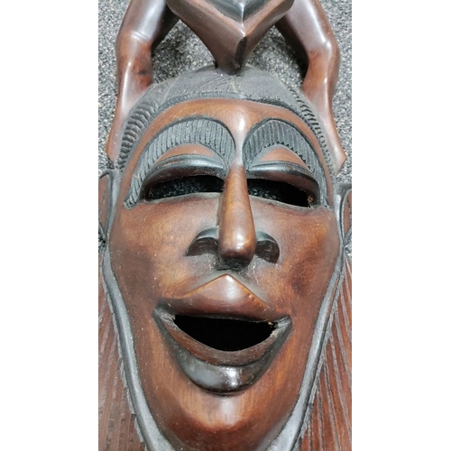 76 - Large hand carved heavy solid African tribal wall mask