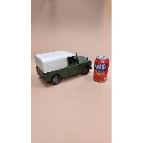 97 - Model tinplate Land Rover Defender