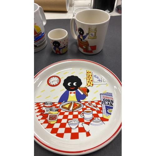 280 - Robertson and sons Breakfast set comprising bowl, mugs and egg cup. Also includes a tin