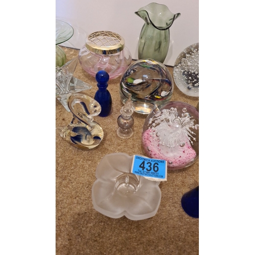 436 - Collection of glassware to include 4 paperweights, vases, candle holders, and small scent bottles. S... 