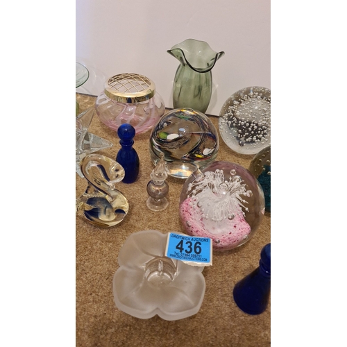 436 - Collection of glassware to include 4 paperweights, vases, candle holders, and small scent bottles. S... 