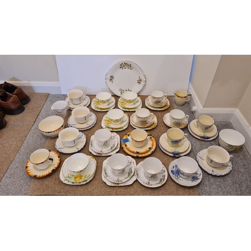 438 - Selection of art deco 1930/40's china to include 13 trios, 6 cups and saucer sets and other pieces a... 