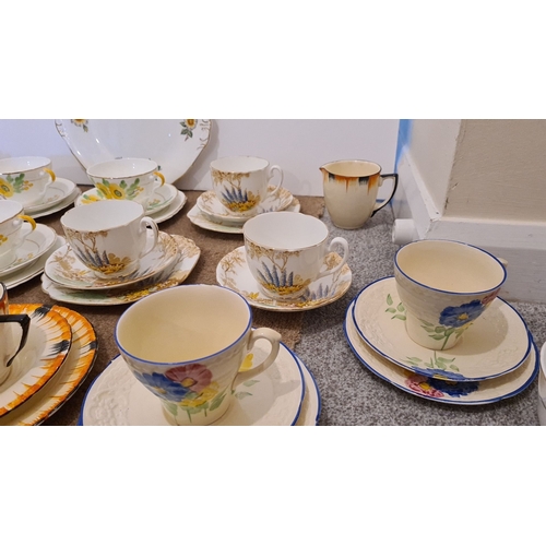 438 - Selection of art deco 1930/40's china to include 13 trios, 6 cups and saucer sets and other pieces a... 