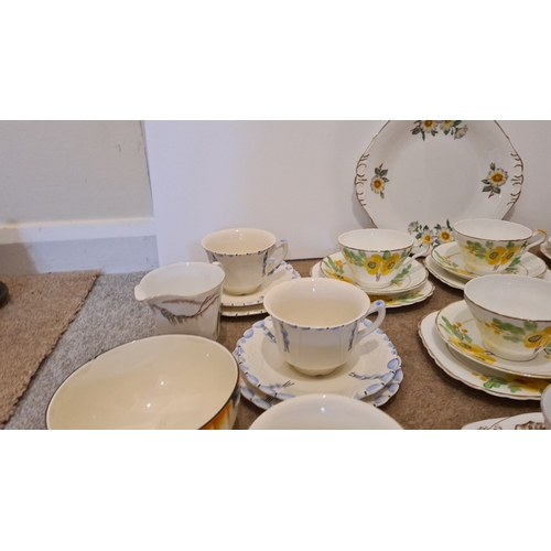 438 - Selection of art deco 1930/40's china to include 13 trios, 6 cups and saucer sets and other pieces a... 