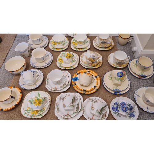 438 - Selection of art deco 1930/40's china to include 13 trios, 6 cups and saucer sets and other pieces a... 