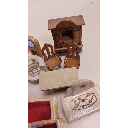 449 - Collection of wooden dolls house furniture