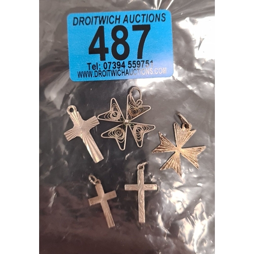 487 - 5 assorted silver crosses