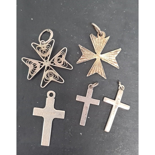 487 - 5 assorted silver crosses