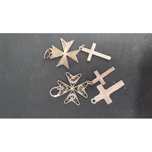 487 - 5 assorted silver crosses