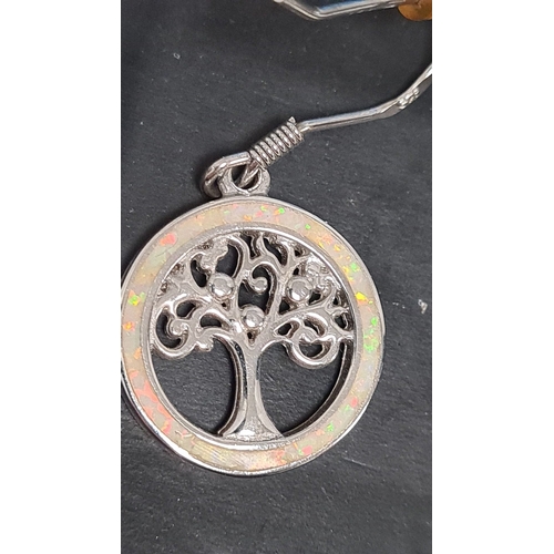 491 - Pair of 925 silver Tree of life earrings with Fire Opal settings