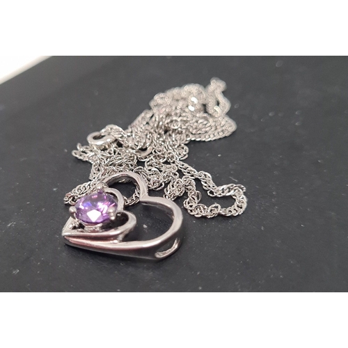 509 - Silver 48cm necklace with amethyst pendant