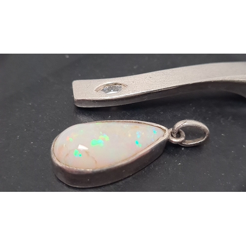 510 - Pair of silver pendants one with opal setting