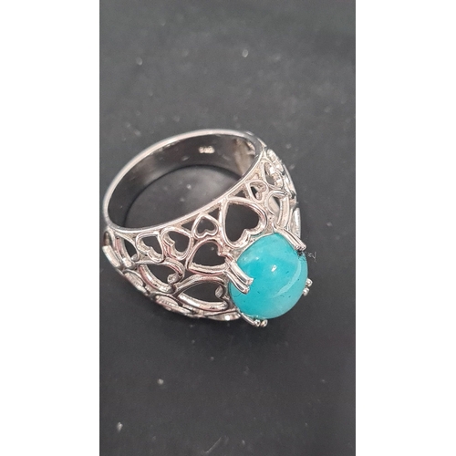 563 - 925 Silver heart design ring, turquoise colour gem stone. Size T