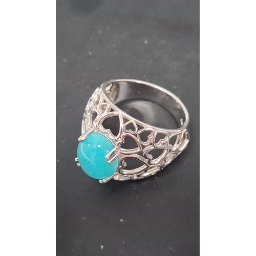 563 - 925 Silver heart design ring, turquoise colour gem stone. Size T