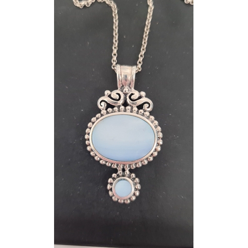 565 - 925 Silver necklace with light blue pearlescent stones. 48cm