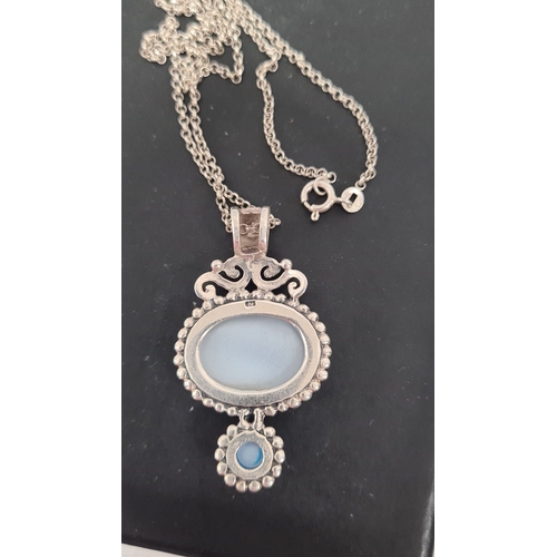 565 - 925 Silver necklace with light blue pearlescent stones. 48cm