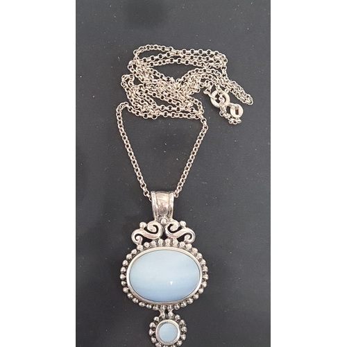 565 - 925 Silver necklace with light blue pearlescent stones. 48cm