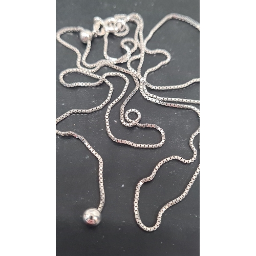 566 - 925 Silver chain with ball bearing style adornment. 60cm