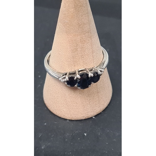 571 - 925 Silver ring 3 black gemstone setting. Size P.